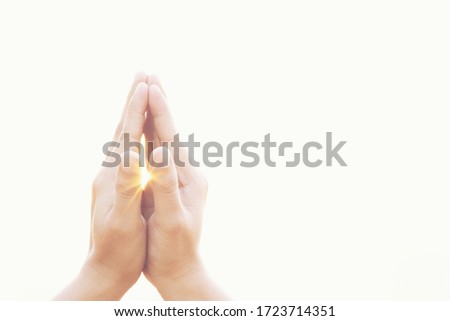 Praying man hoping for better. Asking God for good luck, success, forgiveness. Power of religion, belief, worship. Holding hand in prayer having put together, concept  faith spirituality. Morning sun