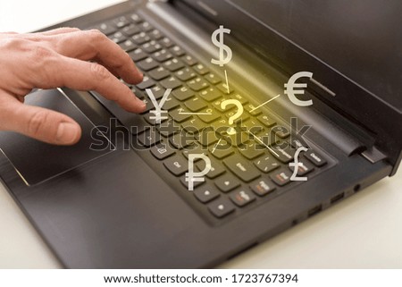 Foreign currency exchange concept, forex trading. Dollar, euro, pound and yen signs with businessman working on computer on background.