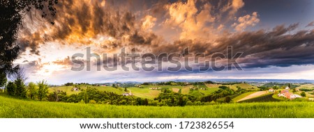 Panorama of vineyards hills in south Styria, Austria. Tuscany like place to visit. Landscape during spring sunset.