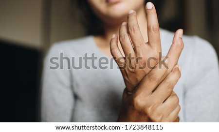 
Close up woman wrist pain, Health problems concept	 Royalty-Free Stock Photo #1723848115