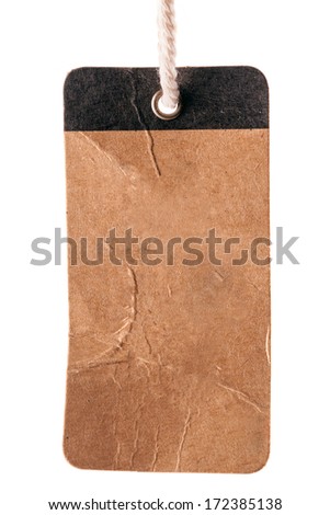 Blank old brown label with string on a white background