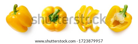 Set of fresh whole and sliced yellow sweet pepper isolated on white background. Top view Royalty-Free Stock Photo #1723879957