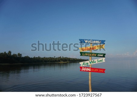 signs direction sea port island
