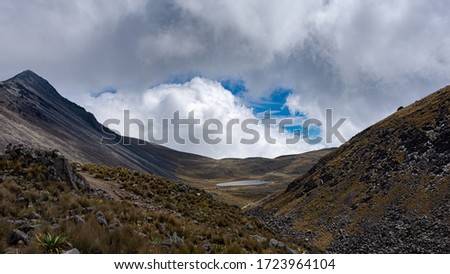 Panoramic of arid, mountainous landscape of a volcano located in Toluca, Mexico.