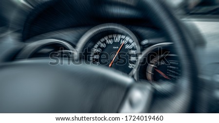 Car speedometer. High speed on a car speedometer and motion blur. Royalty-Free Stock Photo #1724019460