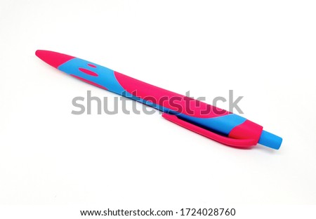 Pink with blue pen isolated on white background. Object or tool for write and draw picture