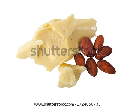 Pieces of natural cocoa butter with cocoa beans isolated on white 
background. Top view. Macro photo Royalty-Free Stock Photo #1724050735