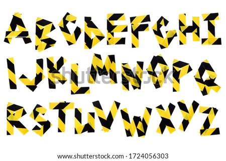 Tape alphabet ABC from yellow and black warning police tape isolated on white background. Caution lines. Danger and risk tape. Police stripe line. Industrial protection sticky tape. set small signs