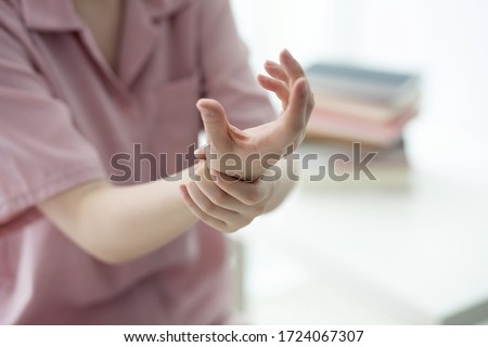 Woman suffering from wrist pain