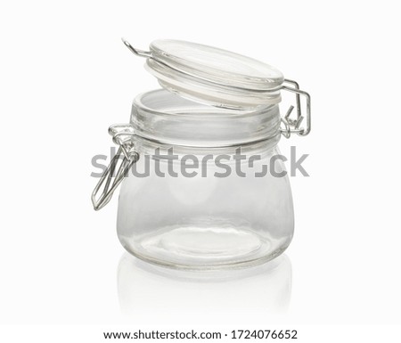 open empty glass jar with metal lock isolated on white