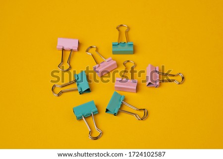 office clips on a yellow background