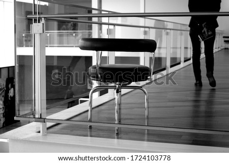 Stainless steel, glass and wood railing.Fall Protection. modern design of handrail and staircase.