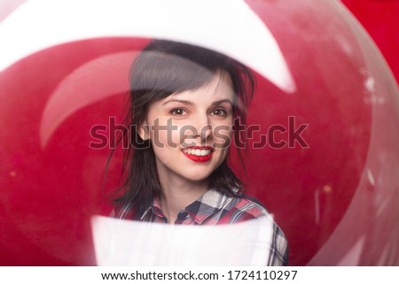 girl in red, photo through the ball