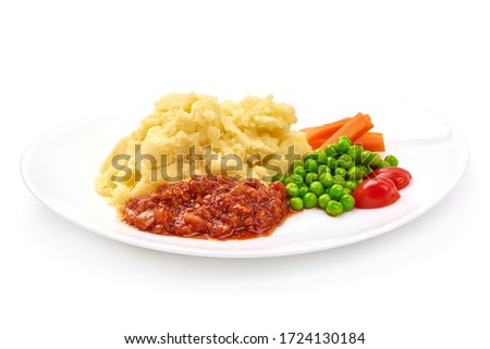Mashed potatoes with tomato sauce, isolated on white background.