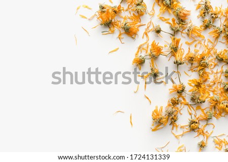 dried marigold flowers, dried marigold flowers on a white background, medicinal plants