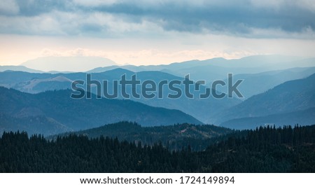 Mountain blue gradient landscape panorama twilight in mountains   Royalty-Free Stock Photo #1724149894