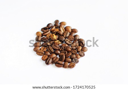 Coffee Beans isolated on white background. Close up view picture.