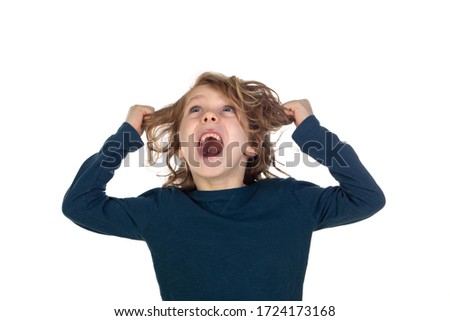 Funny little boy with long hair isolated on a white background