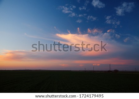 Spectacular colorful sunset with cloudy sky. Photo of textured sky. Scenic image of dramatic light in summer weather. Breathtaking natural wallpaper background. Discover the beauty of earth.