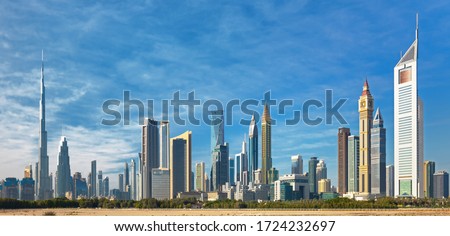 Dubai - modern city center skyline with luxury skyscrapers, United Arab Emirates Royalty-Free Stock Photo #1724232697