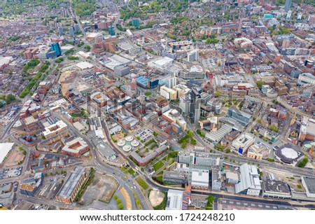 Sheffield UK, 5th May 2020: Aerial photo of the city centre of Sheffield in South Yorkshire in the UK showing Sheffield Hallam University & city centre from above on a sunny summers day. Royalty-Free Stock Photo #1724248210