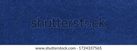 Seamless blue shiny and glitter background. Abstract wide seamless panoramic background with blue sequins texture.