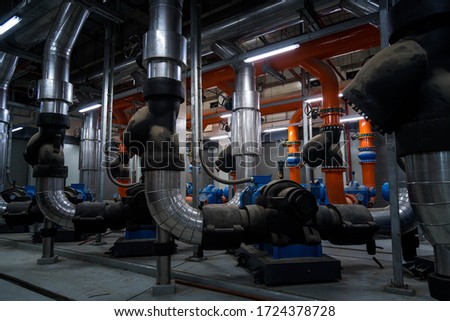 The industry cooling tower air conditioner is water cooling tower air chiller HVAC of large industrial building to control air system. Royalty-Free Stock Photo #1724378728