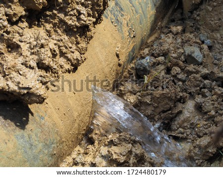 AC pipe size 15 inch diameter  is leaking or burst Royalty-Free Stock Photo #1724480179