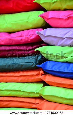 Colorful cushions, pillows shot together.