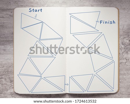 Board game template on a notebook great choice for team building