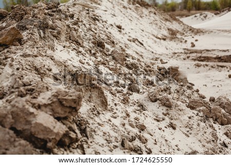 Sand and ground texture in detail. Sand for building. Horizontal photo