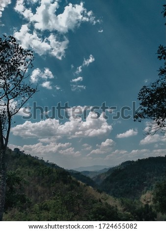 Pictures with clouds and mountains background