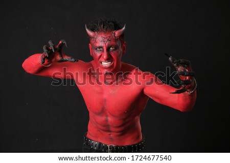 Man red skin angry devil satan