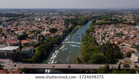 Prospective View by Drone at Italian Countryside with Bridge and River on Background Urban and Nature Concept