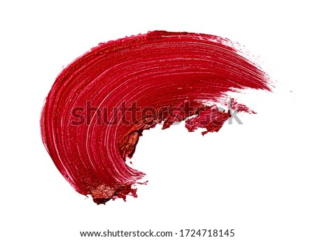 Glossy red lipstick stain swatch isolated on white background