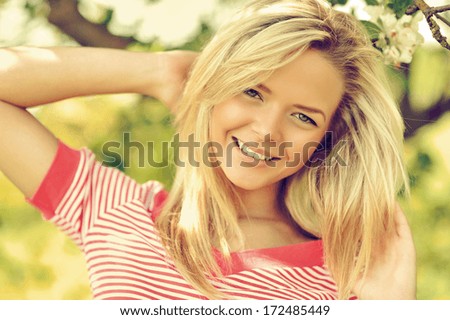 Young happy beautiful girl portrait close up
