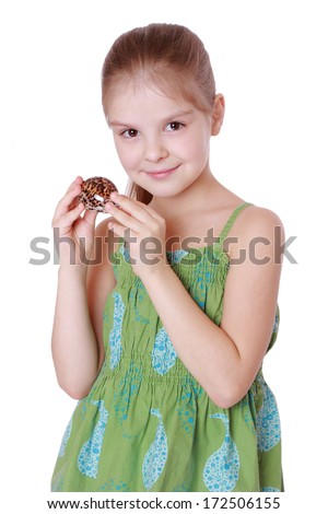 Summer vacation - Listening to the sea - beautiful girl with shell /lovely little girl and sea shell isolated over white