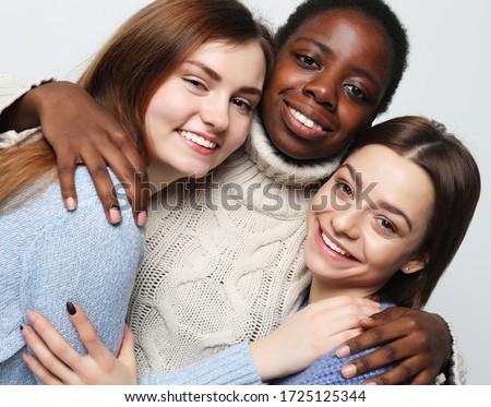 Close-up portrait of charming multiracial girls