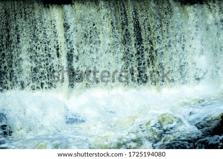 Water Falling from a Dam