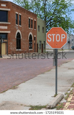 Stop sign along an old brick road in Oklahoma