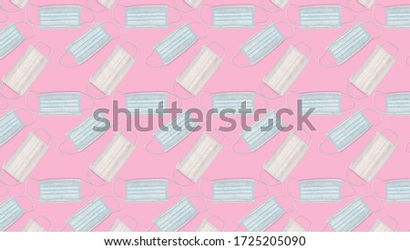 Seamless pattern. Medical mask on pink background. PPE for covid-19 pandemic. coronavirus health concept.
