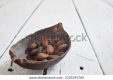 Cocoa Pod And Cocoa Beans On White Wooden Table, Health food, copy space for text