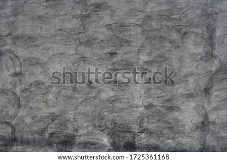 The background picture of the smooth plaster wall made with a slight pattern by mixing black into the plaster.  Used for wall decoration  Both exterior and interior