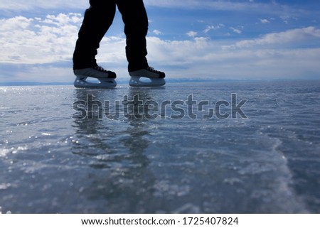 skater on the ice of lake Baikal