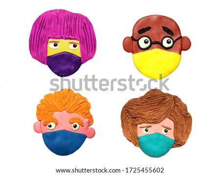 Plasticine simple colorful cartoon faces in respiratory masks isolated on white background. Personal protection during a pandemic