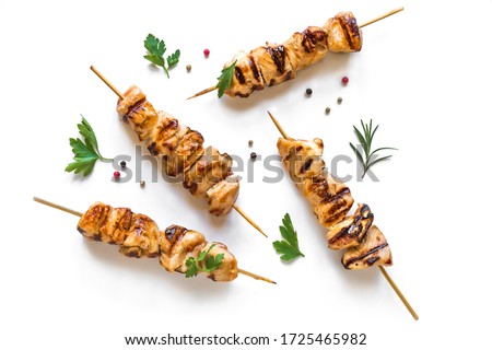 Grilled chicken skewers isolated on white background, top view. Meat pork, chicken or turkey shish kebab with herb and spices. Royalty-Free Stock Photo #1725465982