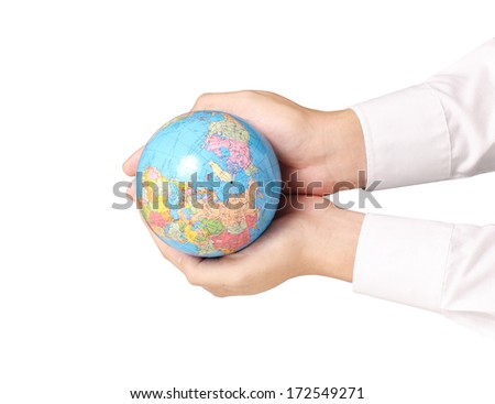 Man holding globe of the earth. "Elements of this image furnished by NASA" 