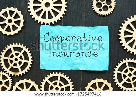 Financial concept about Cooperative Insurance with sign on the sheet.