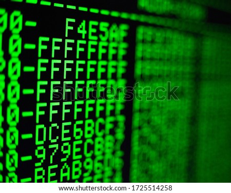 Computer code on the screen. Programming language. Green numbers and letters. Computer science.