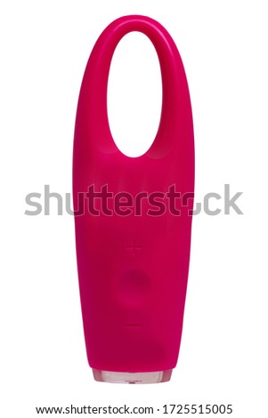 Skin care concept. Close-up of a pink color electric eye massager isolated on a white background. Beauty treatment.